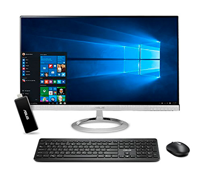 PC compacto usandolo en un monitor con teclado y ratón inalámbrico.